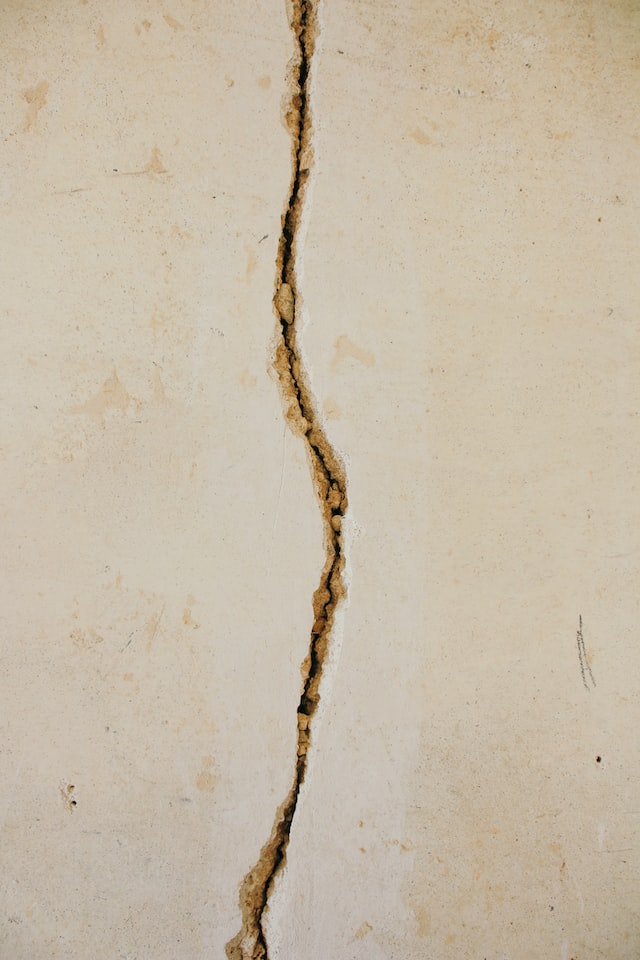 cracked beige wall