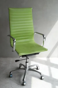 Office chairs like this green one feature sleek metal armrests and a sturdy base on wheels, all set against a plain gray background.
